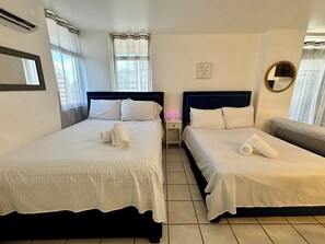 1 bedroom, desk, iron/ironing board, travel crib