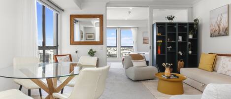 Comfort Apartment | Living area | 55-inch Smart TV with digital channels, Netflix, streaming services