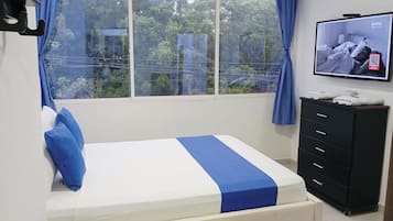 Habitación doble Deluxe | Ropa de cama de alta calidad, camas con pillow-top y wifi gratis