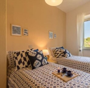 2 habitaciones y ropa de cama