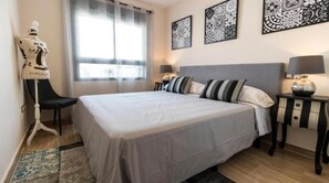 2 dormitorios, tabla de planchar con plancha, wifi gratis y ropa de cama