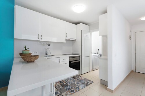 Vacation Home 'Garden Kid Friendly Apartment' with Shared Pool, Wi-Fi and Air Conditioning