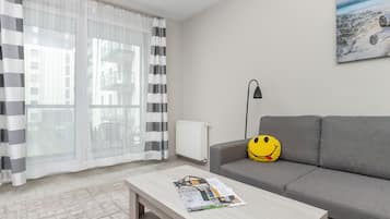 Apartment, 1 Bedroom, Balcony | Living room | 42-inch flat-screen TV with cable channels