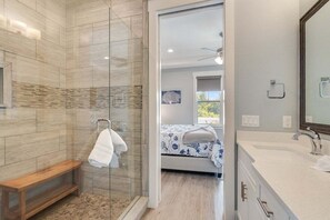 Shower, hair dryer, towels, soap