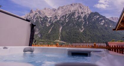 Chalet "Zur Auszeit" avec vue sur les montagnes, terrasse privée et Wi-Fi