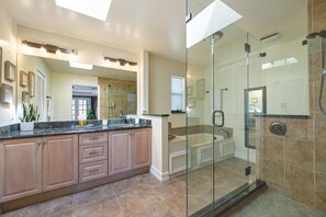 Jetted bath, hair dryer, towels, soap