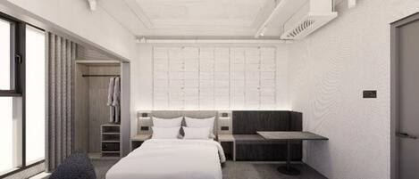 A modern hotel room with a large bed, a desk, and a seating area.