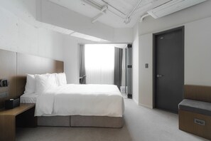 Luxe beddengoed, pillowtop-bedden, een kluis op de kamer, een bureau