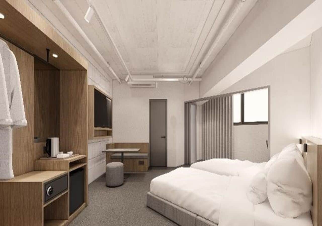 尊贵双床房 | 高档床上用品、加厚床垫、客房内保险箱、办公桌