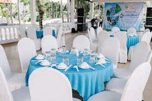 Enjoy a formal dining experience in our beautifully set outdoor event space, surrounded by lush gardens.