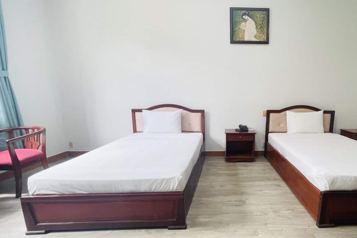 Kamar Double atau Twin Deluks, pemandangan kolam renang | 1 kamar tidur, meja kerja, setrika/meja setrika, dan Wi-Fi gratis