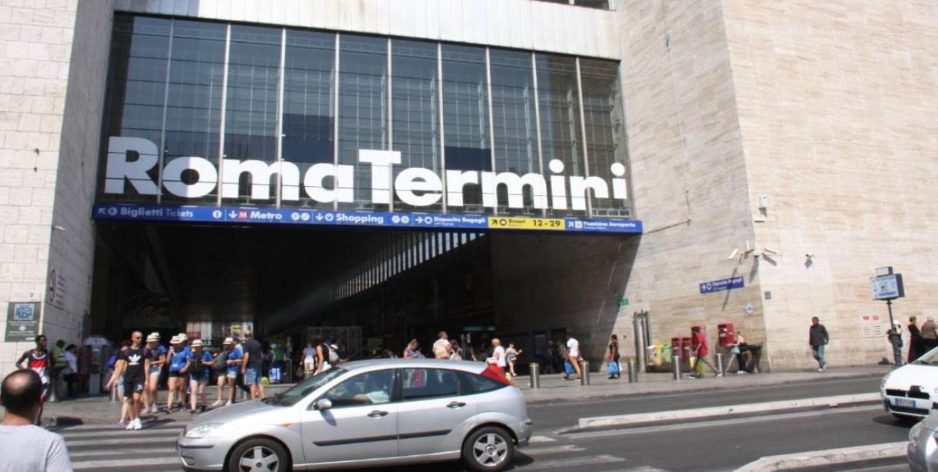 A building with a large sign reading "RomaTermini".
