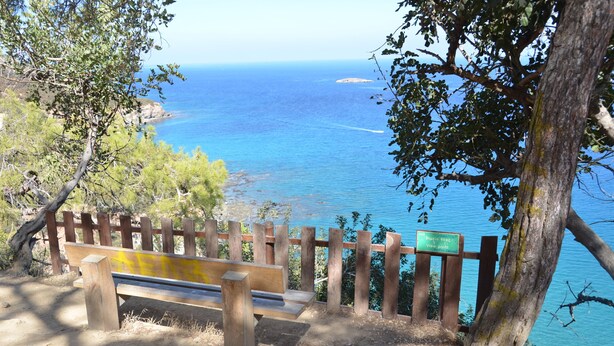 A wooden bench overlooking a coastal view with a sign indicating a viewpoint. - Cyprus, 2 Beds Ensuite, Pool, Patio, Wifi, Parking (Polis)