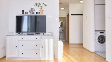 Apartment, Balcony, Sea View | Living area | Smart TV