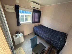 Desk, laptop workspace, free WiFi, bed sheets - 58 Village Tanegashima (Nishinoomote)