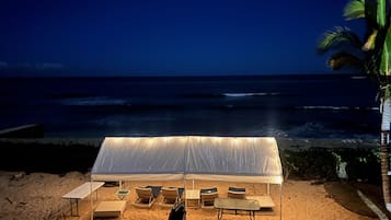 On the beach, sun loungers, beach towels
