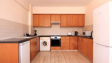 Luxury Apartment | Private kitchen | Fridge, microwave, stovetop, toaster