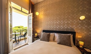 Deluxe Double Room, Balcony | In-room safe, laptop workspace, blackout drapes, iron/ironing board