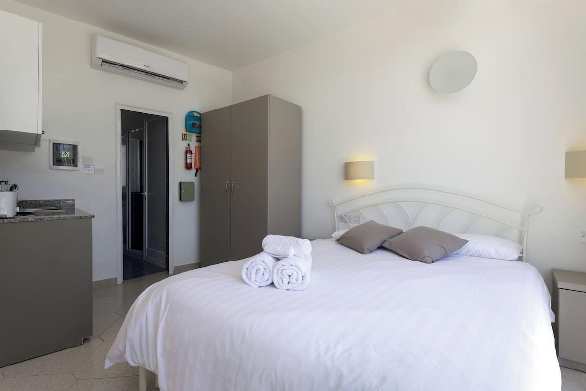 In-room safe, desk, laptop workspace, iron/ironing board