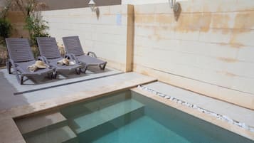 Outdoor pool, open 8:00 AM to 8:00 PM, pool umbrellas, sun loungers