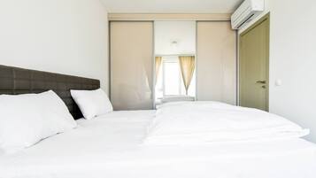 1 dormitorio, tabla de planchar con plancha, cuna de viaje y wifi gratis