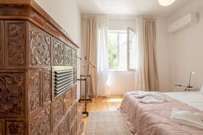 2 dormitorios, tabla de planchar con plancha, wifi gratis y ropa de cama