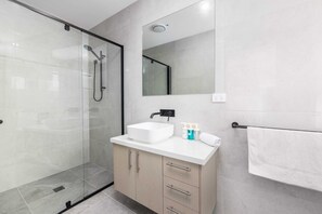 Shower, hair dryer, towels
