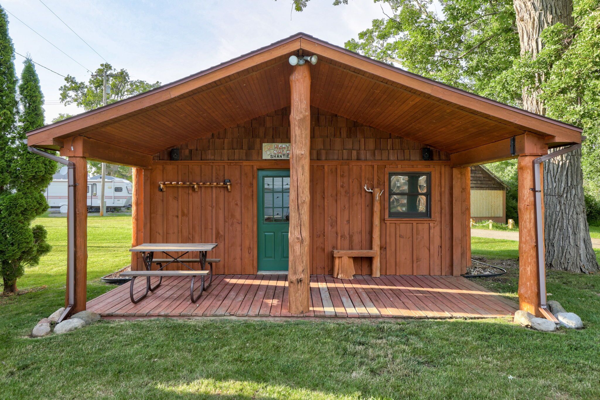 Outdoorsman log cabin near the bay.