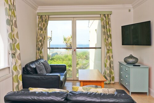 Beachside apartment, two storeys with sea views