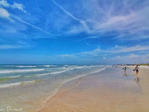 On the beach, sun loungers, beach towels