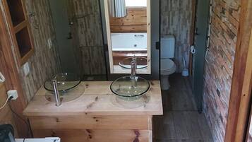 Cabana luxo, vista para o jardim | 1 quarto, quartos à prova de som, Wi-Fi de cortesia, roupa de cama