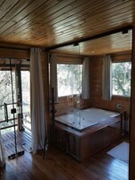 Cabaña Deluxe, vistas al jardín | 1 dormitorio, sistema de insonorización, wifi gratis y ropa de cama