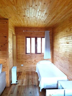 Cabana clássica, vista para o jardim | 1 quarto, quartos à prova de som, Wi-Fi de cortesia, roupa de cama