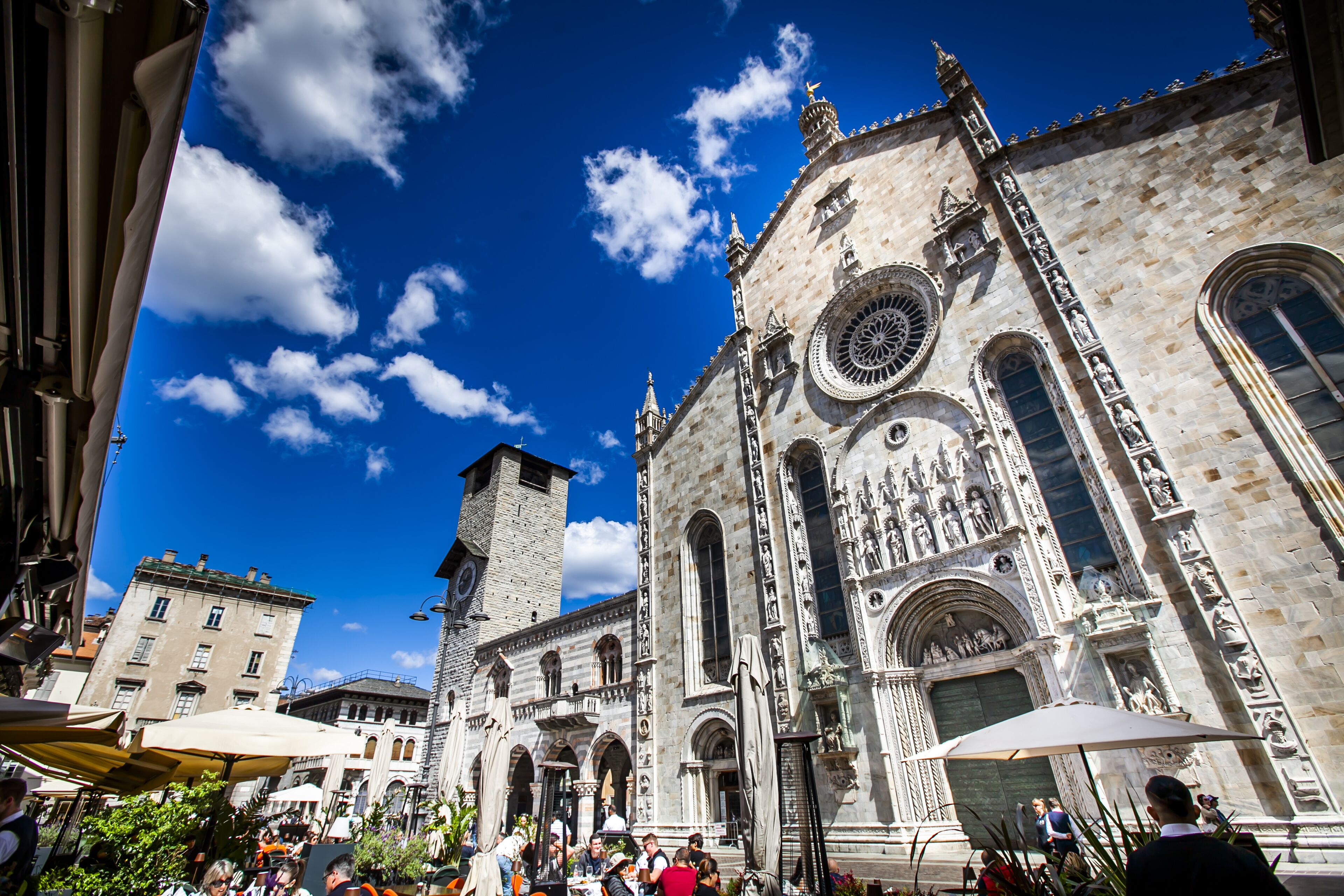 A historic building with intricate architectural details, including a prominent clock tower and arched windows.