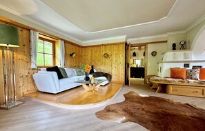 Comfort Chalet, Mountain View | Living area | Flat-screen TV, fireplace, heated floors