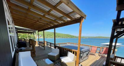 AMAZING WATERFRONT HOME WITH HOT TUB. BOTH HAVE EXTENSIVE VIEWS OF THE LAKE