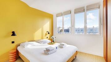 2 habitaciones, tabla de planchar con plancha, cuna de viaje y wifi