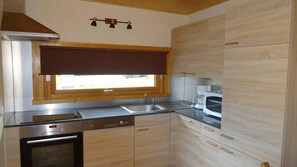 Private kitchen - Wifi, 350m from ski lifts, 1st floor, balcony, parking, 60m², Les Gets (Les Gets)