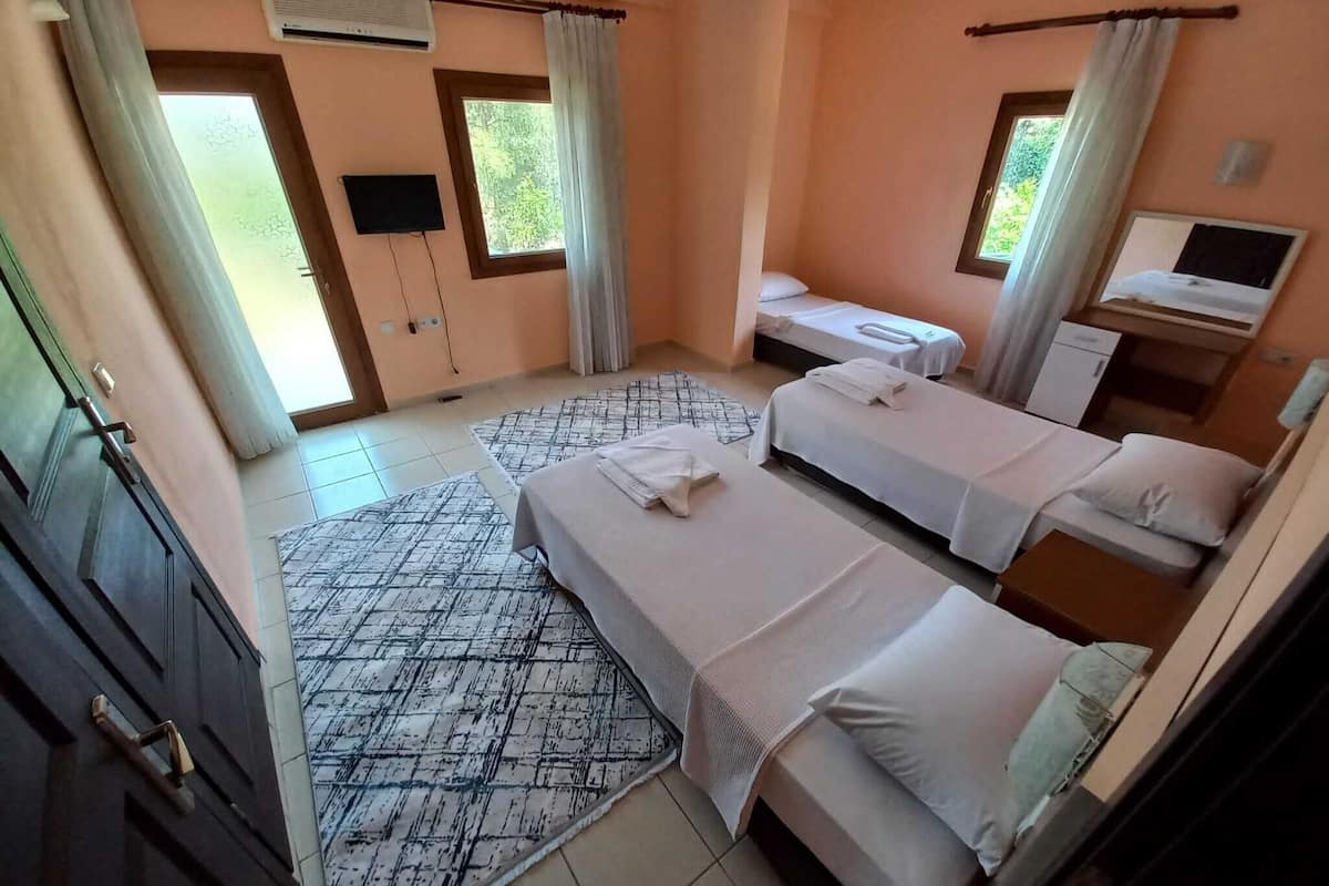 Familiekamer, uitzicht op tuin | 1 slaapkamer, gratis wifi