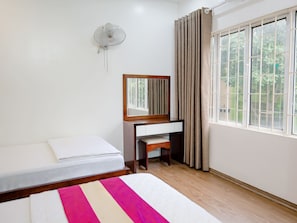 Family Room, City View | Premium bedding, down comforters, memory foam beds, minibar