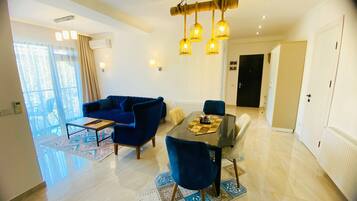 Luxury Apartment, City View | Living area