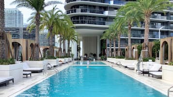 Outdoor pool, pool umbrellas, sun loungers