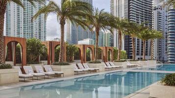 Outdoor pool, pool umbrellas, sun loungers