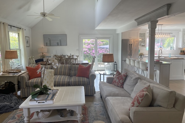 Living area on 1st floor with wood burning fireplace