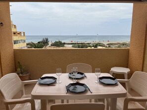 Enjoy a romantic meal for two in this Mediterranean-style dining area overlooking the beach.