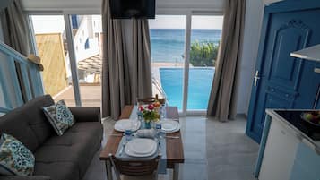 Villa de lujo, alberca privada, vista al mar | Área de sala de estar