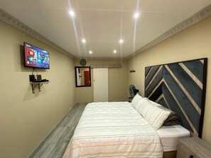 1 chambre, fer et planche Ă repasser, Wi-Fi, draps fournis
