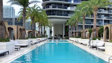 Outdoor pool, free pool cabanas, pool umbrellas