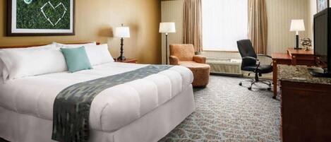 Een strijkplank/strijkijzer, beddengoed