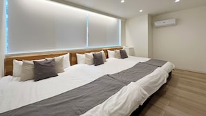 A modern hotel room with a large bed, a wooden headboard, and a large window with blinds. - Nikke 201 (Hiroshima)